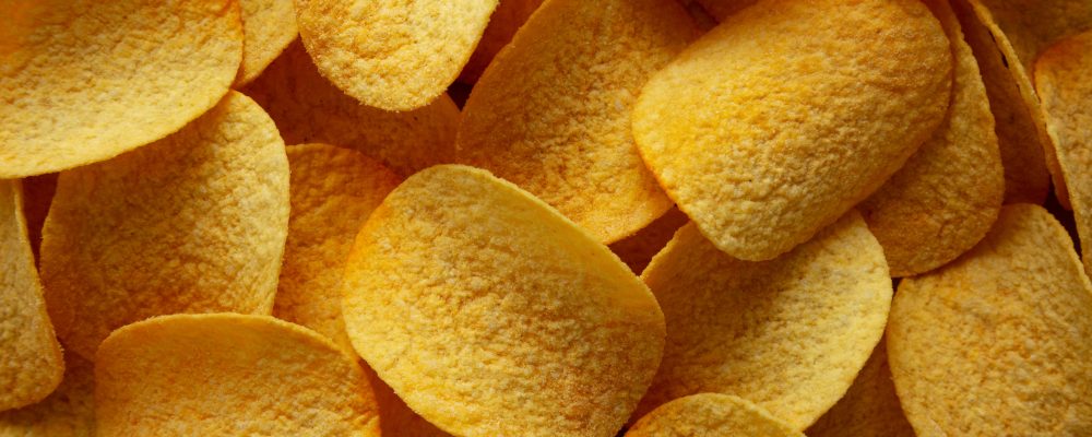 Bacon flavoured potato chips, top view.