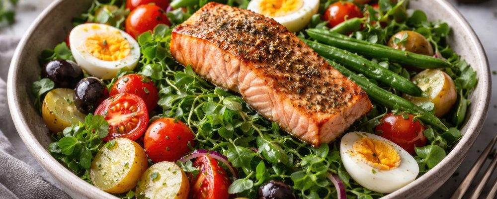 Vibrant Nicoise Salad Featuring Salmon Fresh Green Beans Cherry Tomatoes and Seasoned Watercress