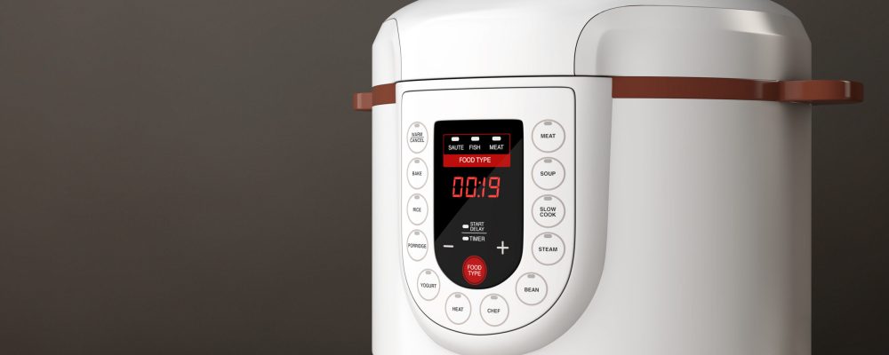 Modern Electric Multi Cooker on a wooden table. 3d Rendering