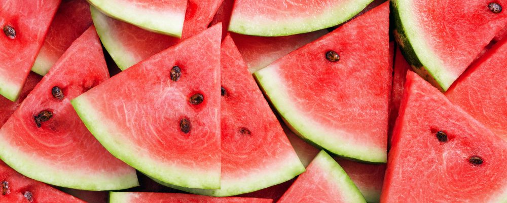 heap of watermelon slices as background