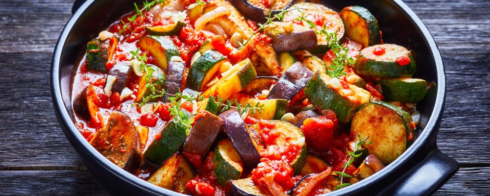 veggies ragout in a black ceramic dish