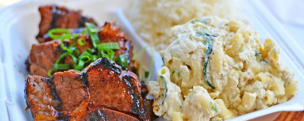 Korean style kalbi beef short ribs with white rice and macaroni salad Hawaiian style plate lunch on Oahu in Hawaii