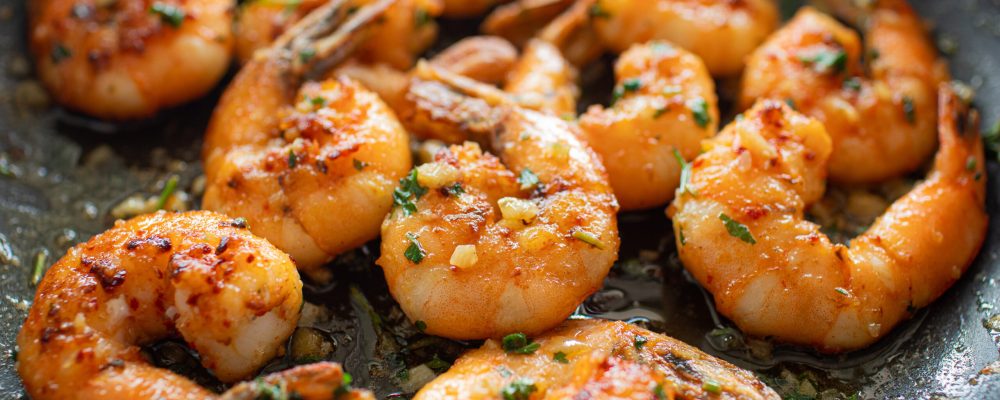 fried shrimp with garlic butter parsley