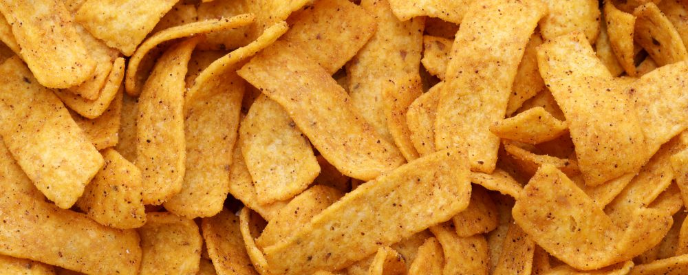 a heap of rectangular corn chips for frito pie