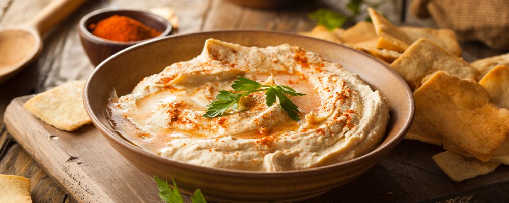 Healthy Homemade Creamy Hummus with Olive Oil and Pita Chips